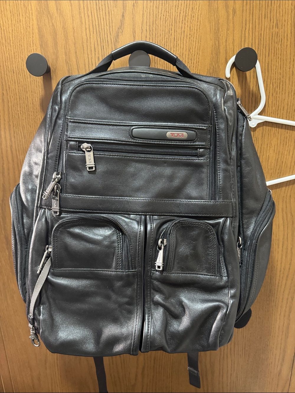 Tumi Black Leather Travel Backpack with Front Pockets